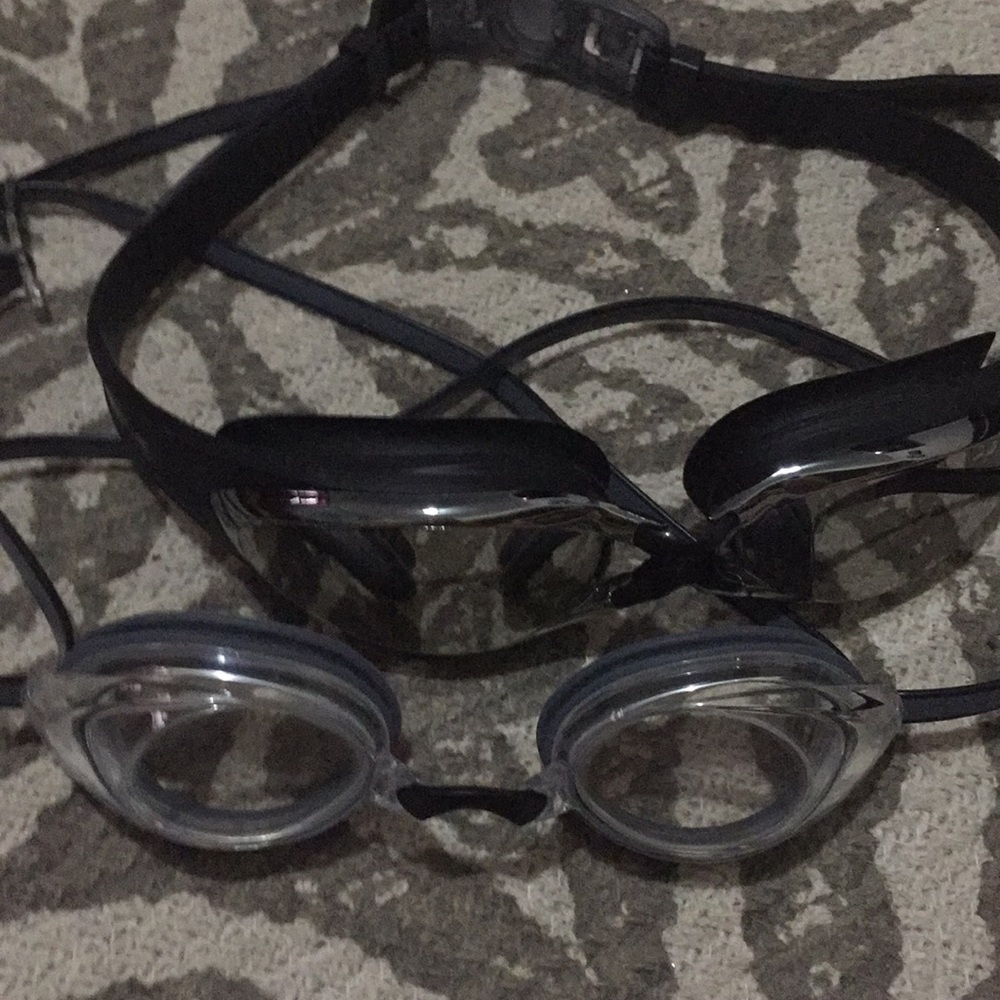 Two barely used swim goggles